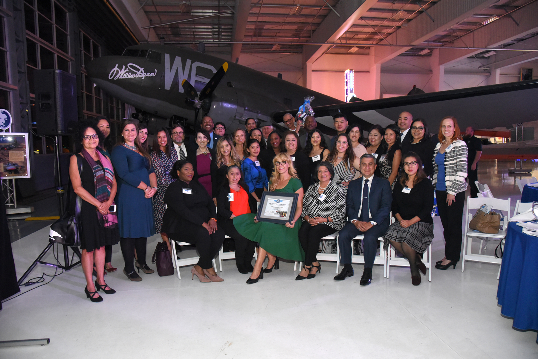 Photo of staff at the "Come Fly with Us" fundraiser